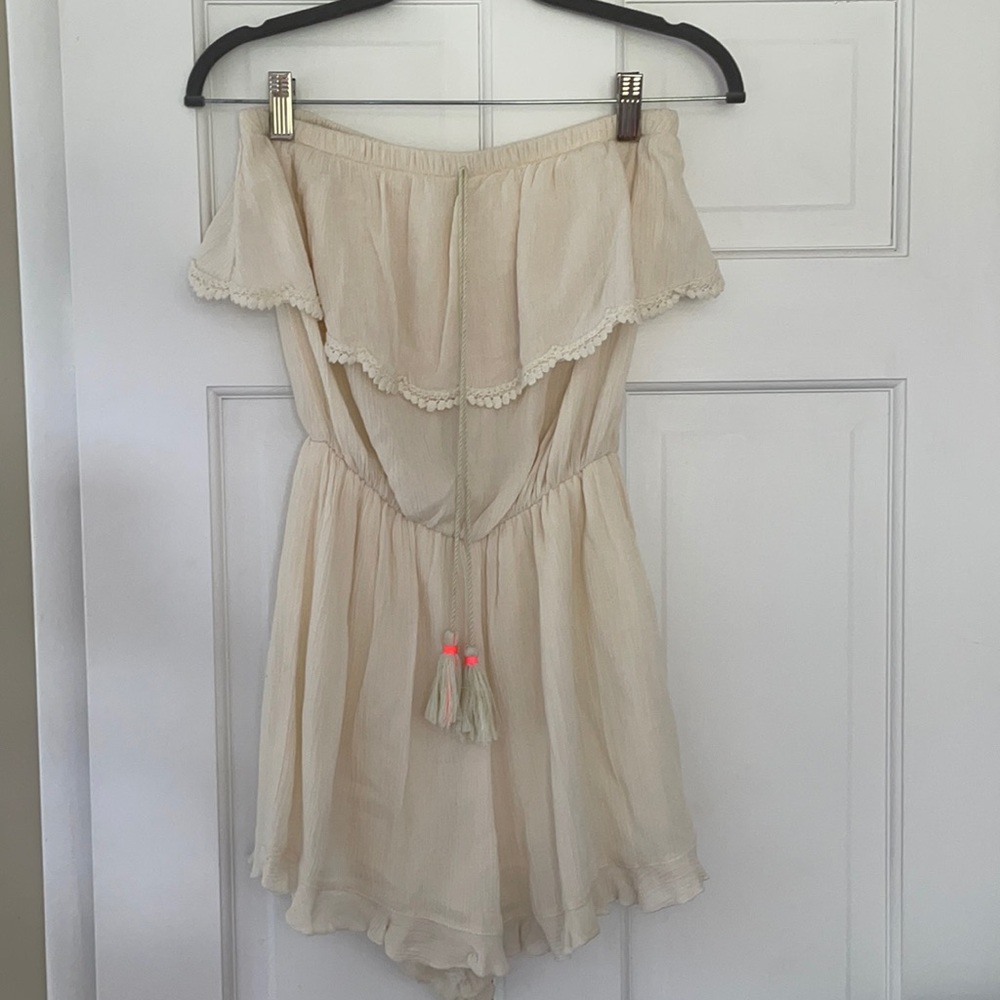 Charlotte Russe Cream Colored Romper With Tie Detailing